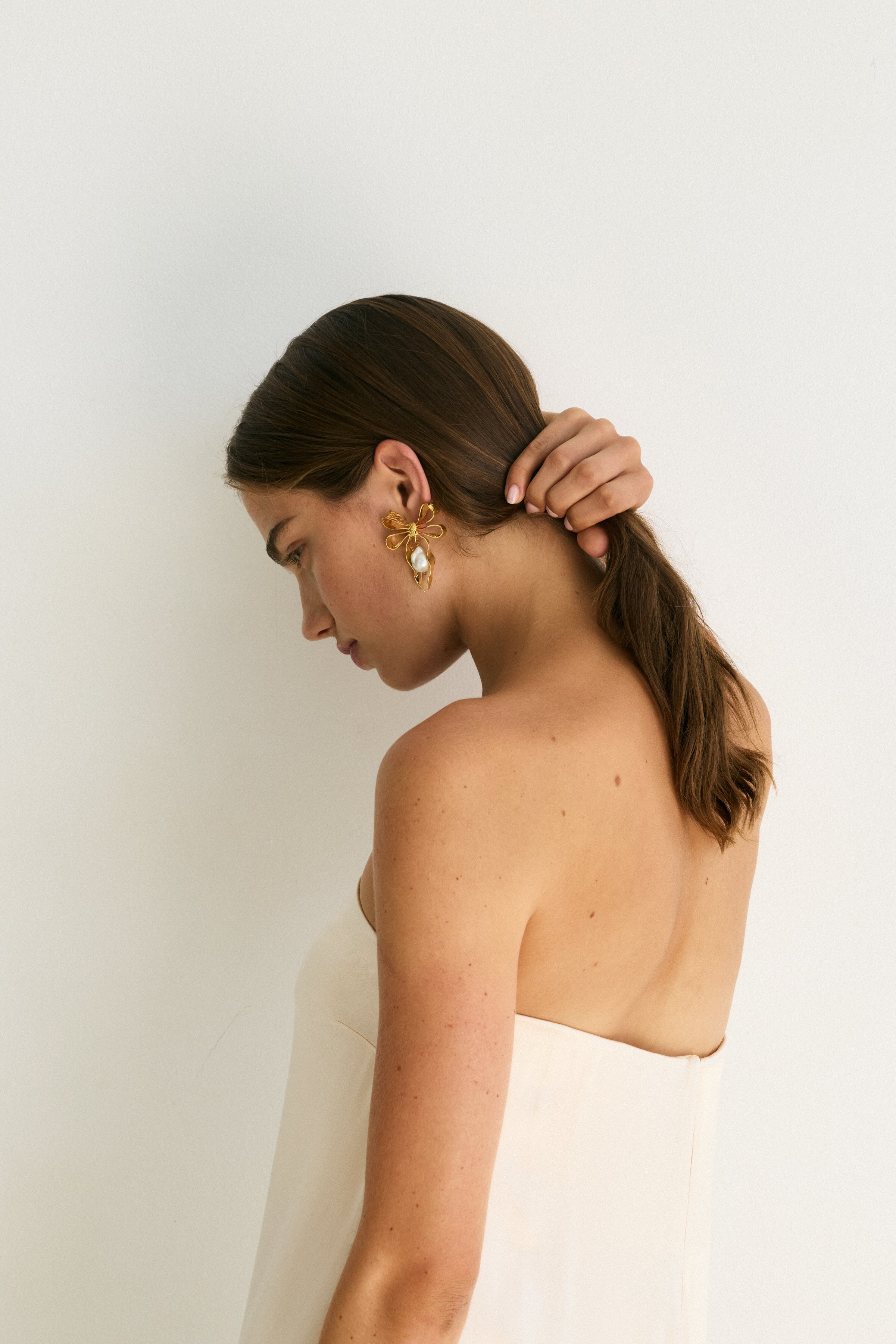 Luxury Designer Gold Bow Pearl Delina Earrings by Christie Nicolaides