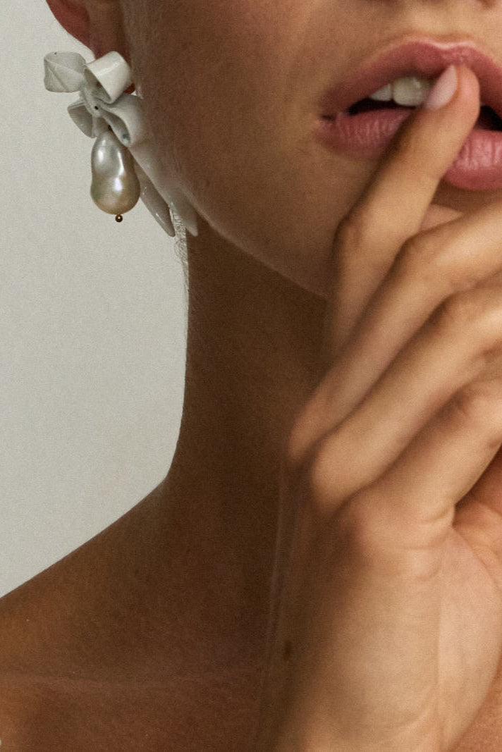 Luxury Designer Delina White Bow Pearl Earrings by Christie Nicolaides
