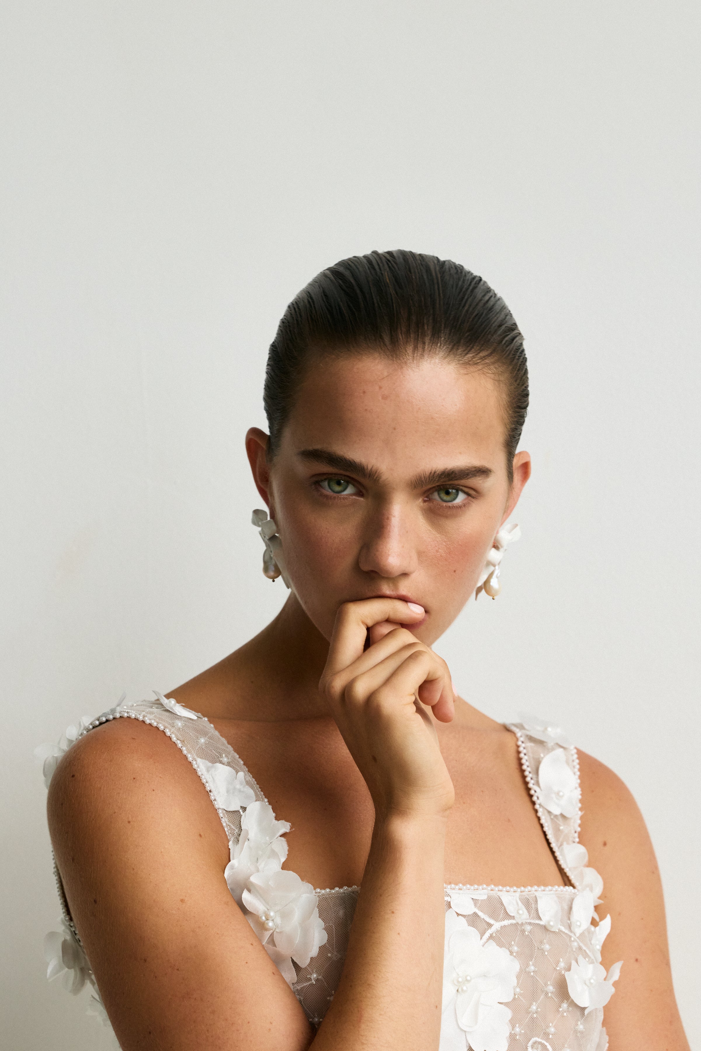 Luxury Designer Delina White Bow Pearl Earrings by Christie Nicolaides